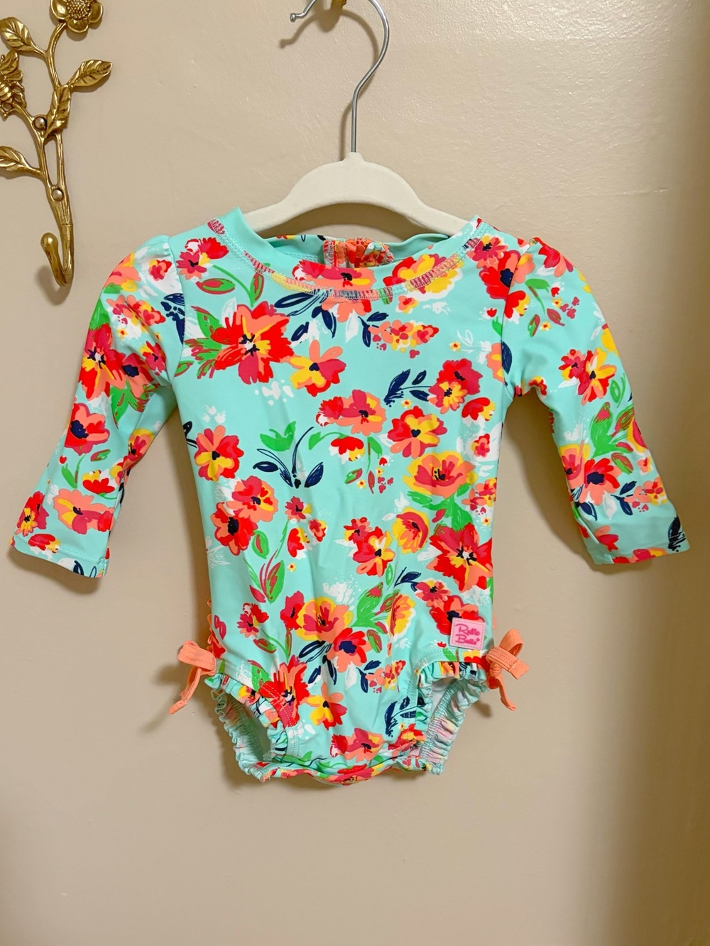 Ruffle Butts Floral Long-Sleeve One-Piece Swimsuit with Coral Accents